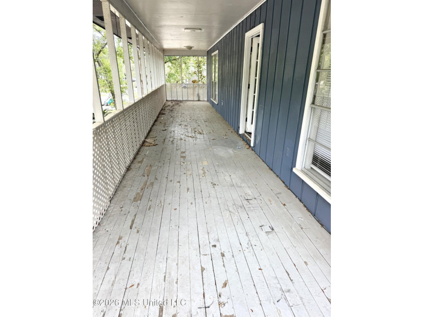 AS-IS Investment Opportunity in Ocean Springs! Unlock the - photo 3