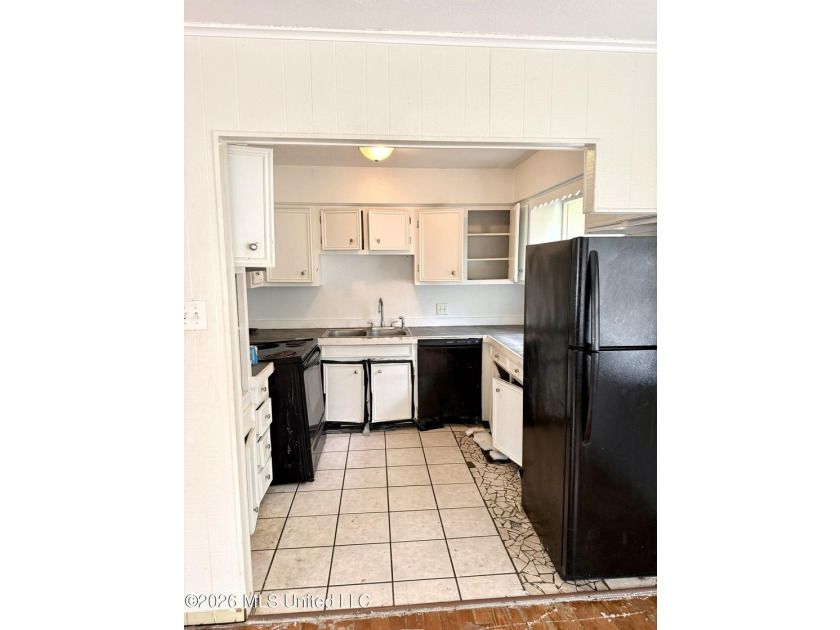 AS-IS Investment Opportunity in Ocean Springs! Unlock the - photo 5