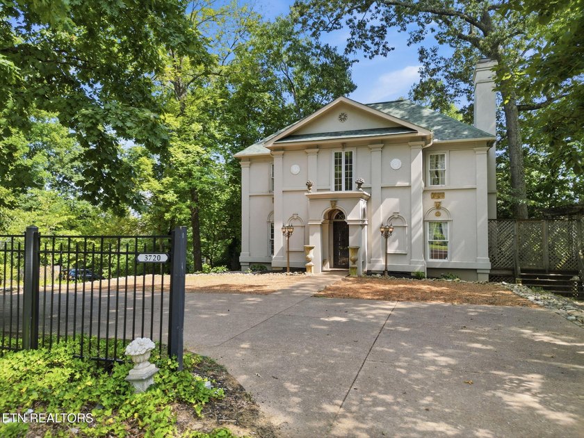 This custom built house is a combination of Greek Revival and - photo 2