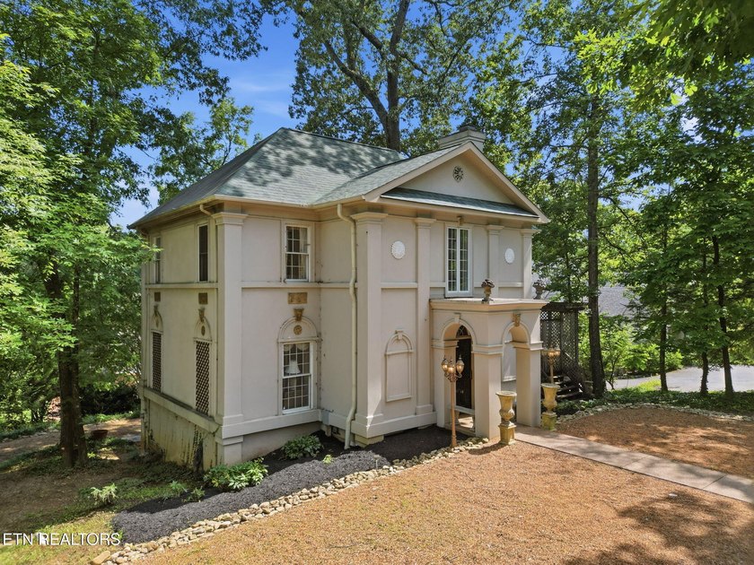 This custom built house is a combination of Greek Revival and - photo 3