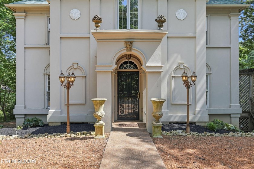 This custom built house is a combination of Greek Revival and - photo 4