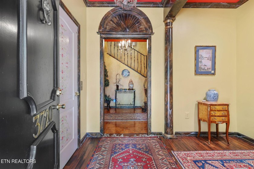 This custom built house is a combination of Greek Revival and - photo 5