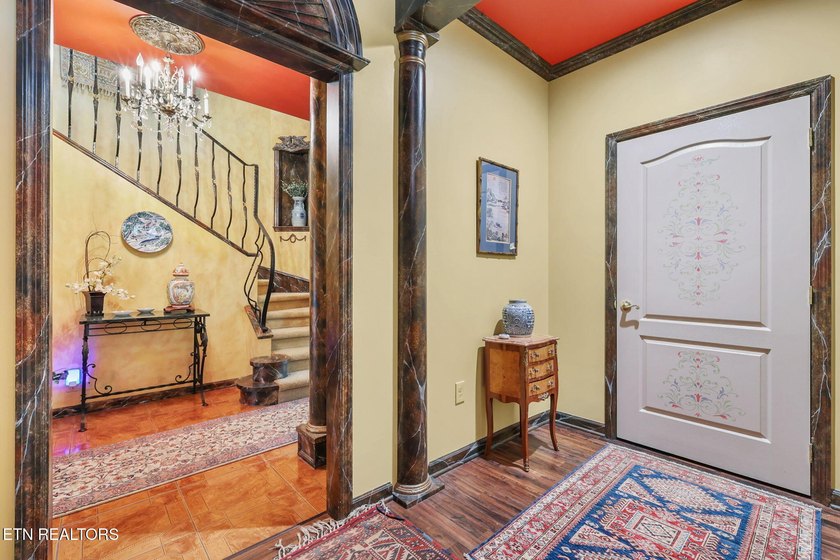 This custom built house is a combination of Greek Revival and - photo 8
