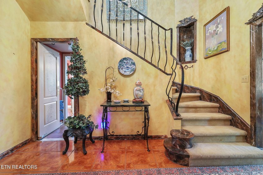 This custom built house is a combination of Greek Revival and - photo 9