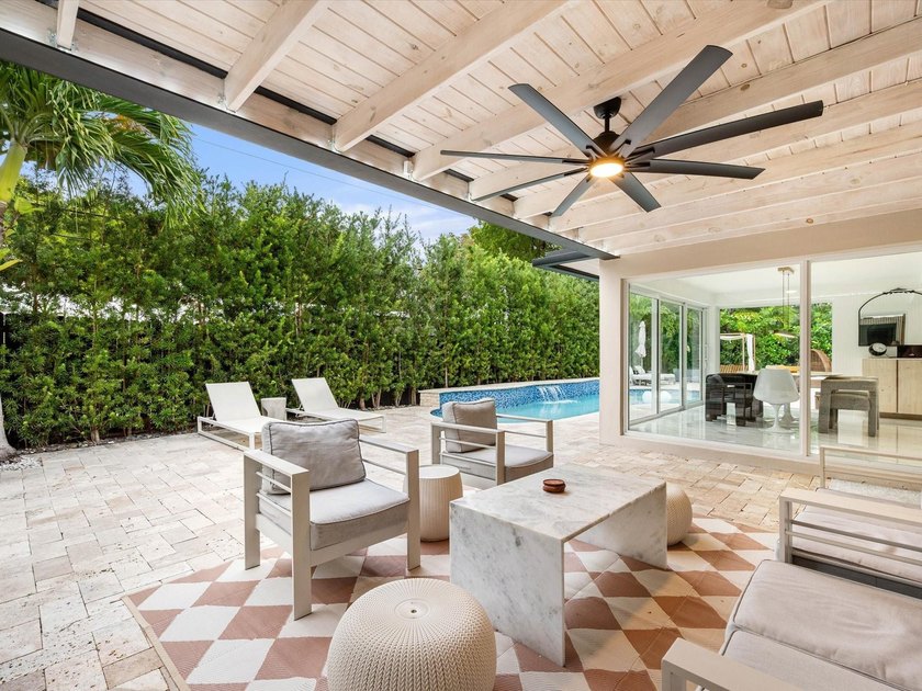LUXURY updated 4 bedroom/3 bathroom SMART home in Coral Ridge - photo 5