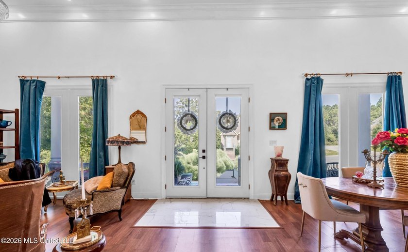 Custom Acadian Masterpiece on Private Corner Lot in Coveted - photo 3