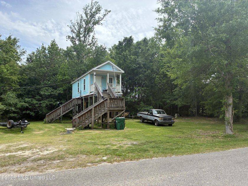 Charming cottage nestled on a spacious half-acre lot in the - photo 5