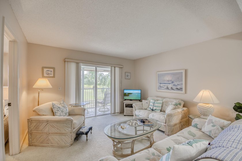Terrific 55+ living! Extra bright end unit with beautiful golf - photo 4