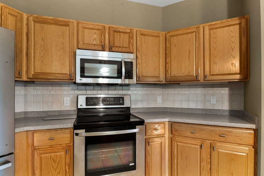 Enjoy peaceful living &amp; abundant natural light in this - photo 12