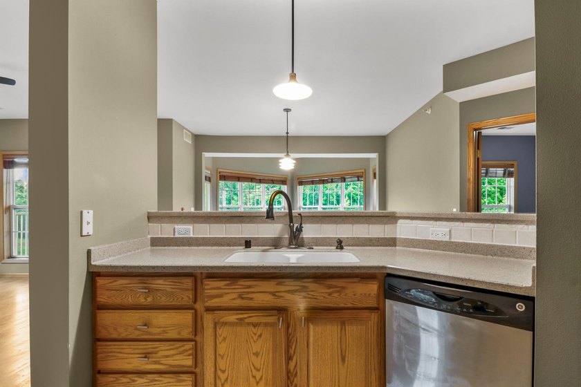 Enjoy peaceful living &amp; abundant natural light in this - photo 13