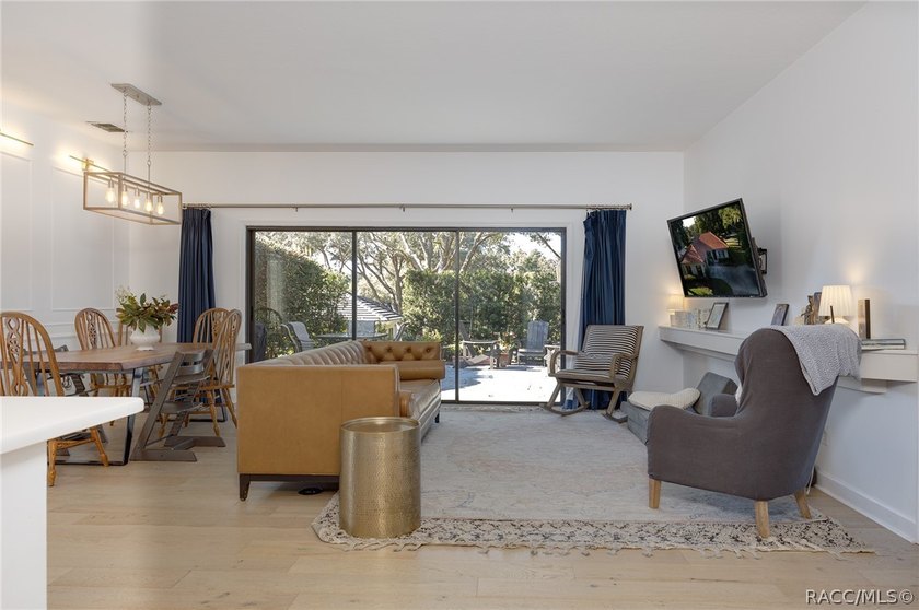 description: Beneath the shade of grand oaks, this updated 3-bed - photo 15