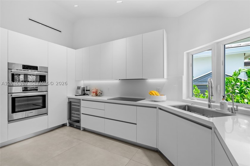 Step into this tastefully fully renovated 4 bedroom, 3.5 - photo 10