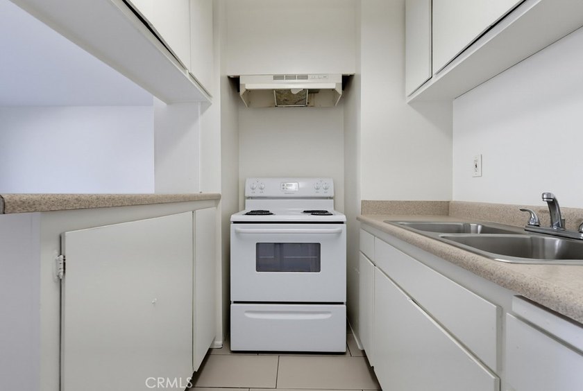 Don't miss this ground level studio condo with inside view of - photo 5