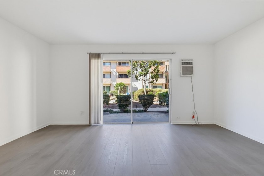 Don't miss this ground level studio condo with inside view of - photo 7