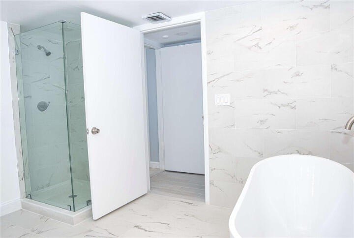 Beautifully renovated 2-bedroom, 2-bath corner residence on the - photo 22