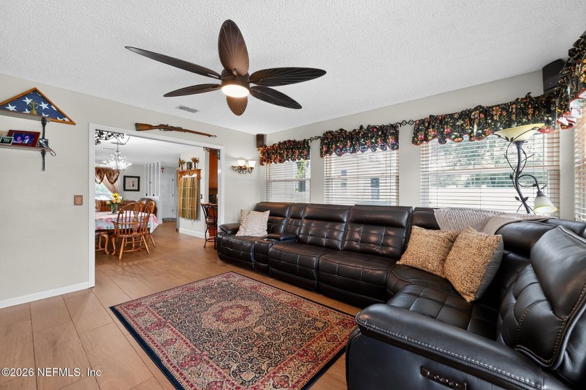 Welcome home to this beautifully maintained property featuring a - photo 11