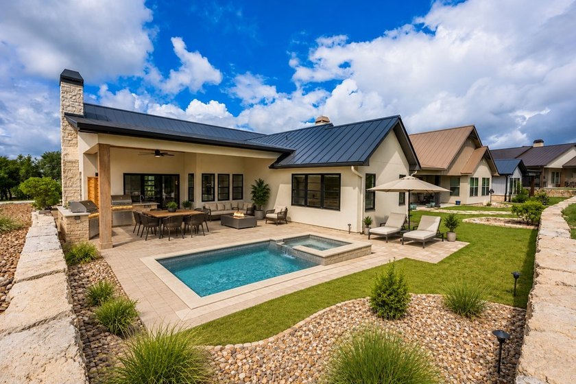 Experience luxury Hill Country living in this stunning rock &amp; - photo 34