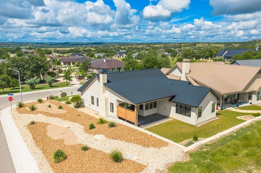 Experience luxury Hill Country living in this stunning rock &amp; - photo 39