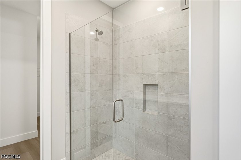 Enjoy a free golf cart with home purchase! This exceptional - photo 13