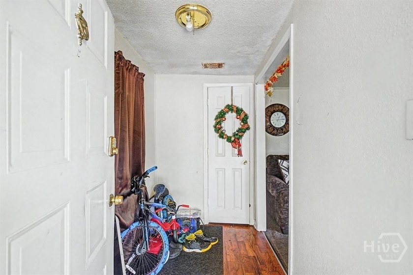 This all brick 3-bedroom, 1-bath all-brick home presents an - photo 22