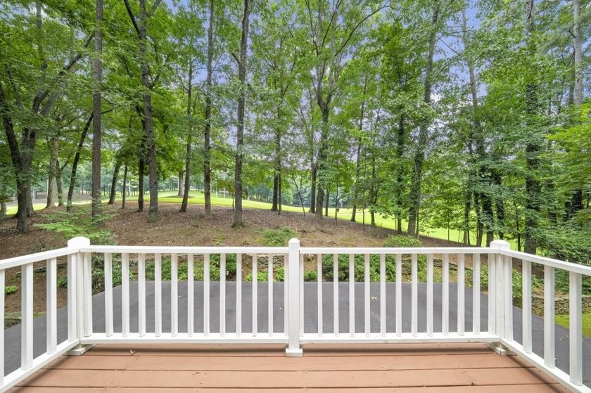 Beautifully set back from the street along the 15th fairway of - photo 40