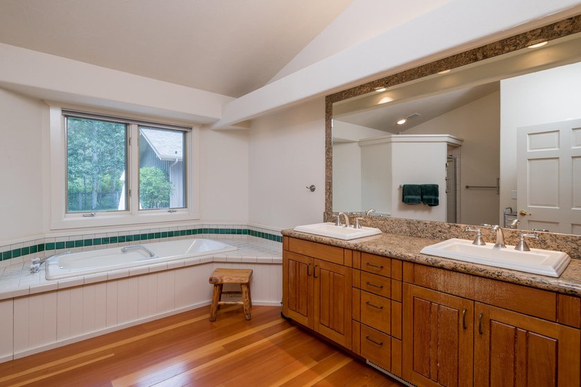 This charming home is a jewel on a mature one-acre lot. The - photo 17