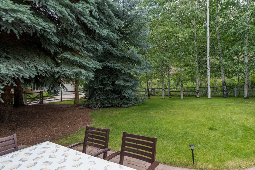 This charming home is a jewel on a mature one-acre lot. The - photo 27