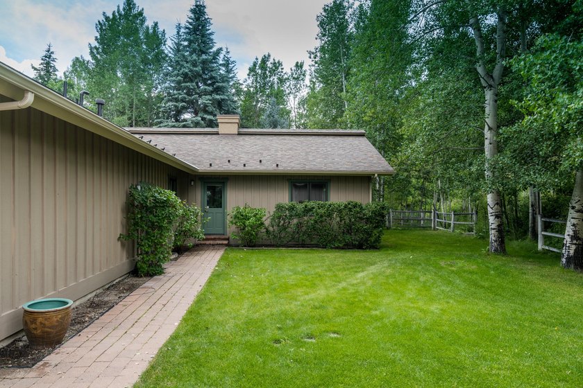 This charming home is a jewel on a mature one-acre lot. The - photo 31