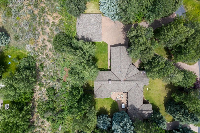 This charming home is a jewel on a mature one-acre lot. The - photo 32