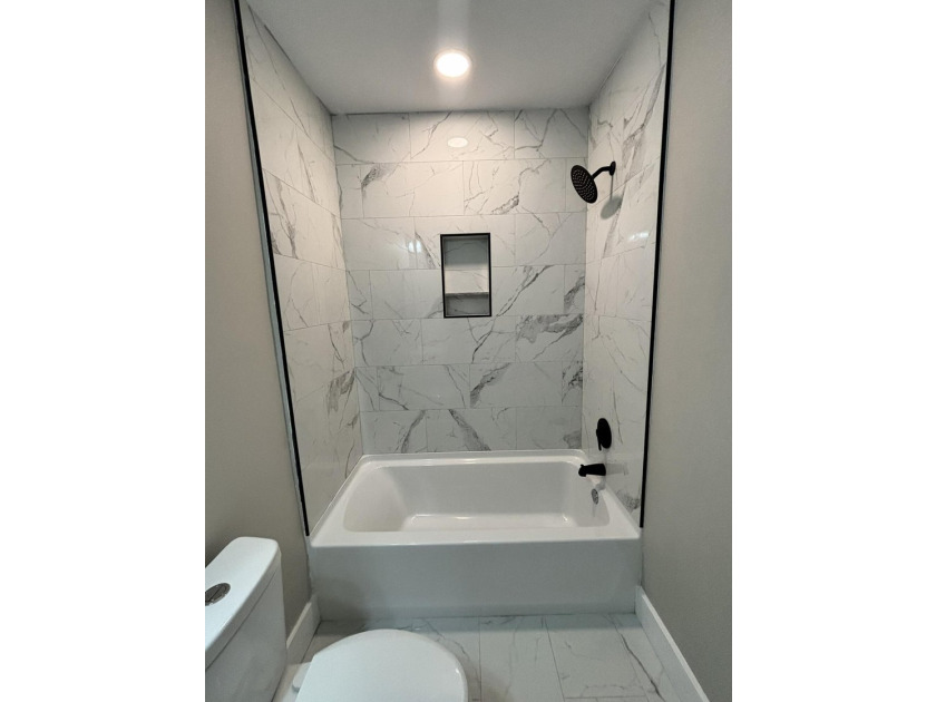 Welcome Home! This adorable home has been fully renovated and is - photo 11