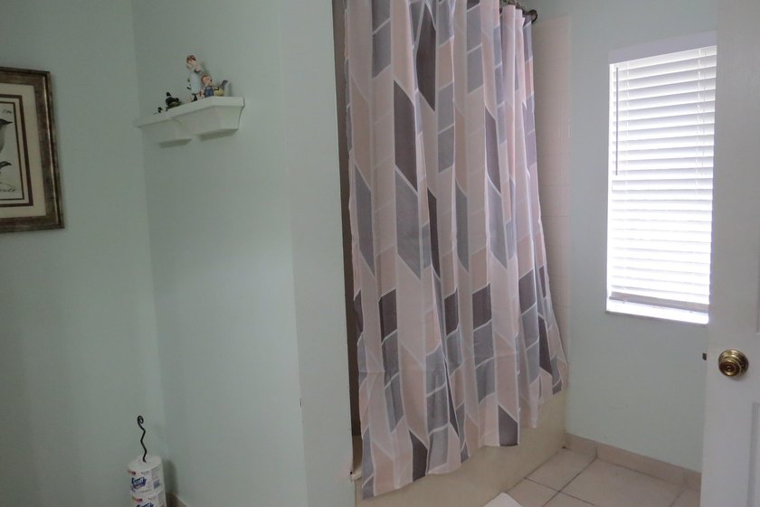 This spacious 4-bedroom, 2-bath home 2 car garage is full of - photo 11