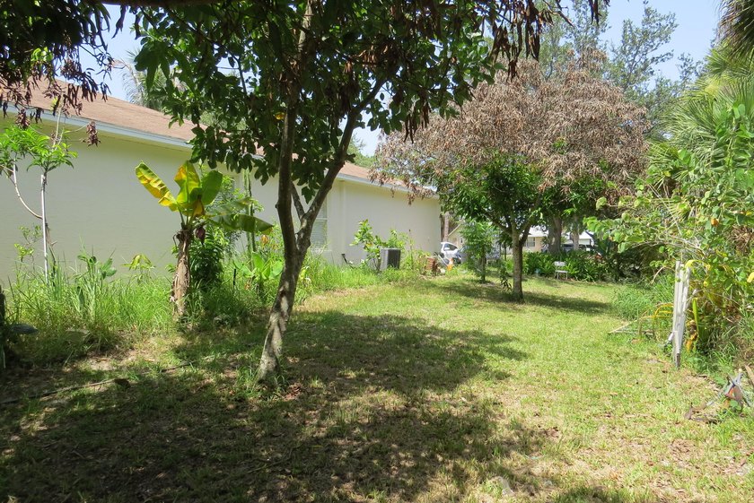 This spacious 4-bedroom, 2-bath home 2 car garage is full of - photo 14