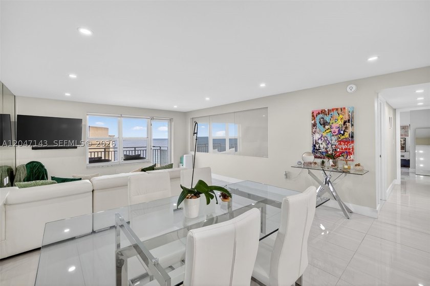 Mesmerizing views from this FULLY RENOVATED corner unit with - photo 6