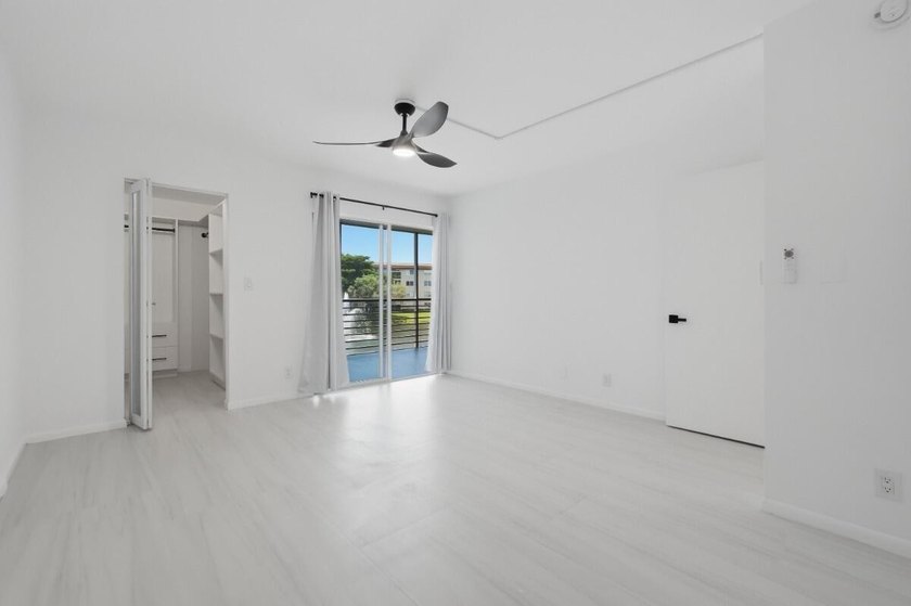 Welcome to this impeccably renovated 2-bedroom, 2-bath residence - photo 3