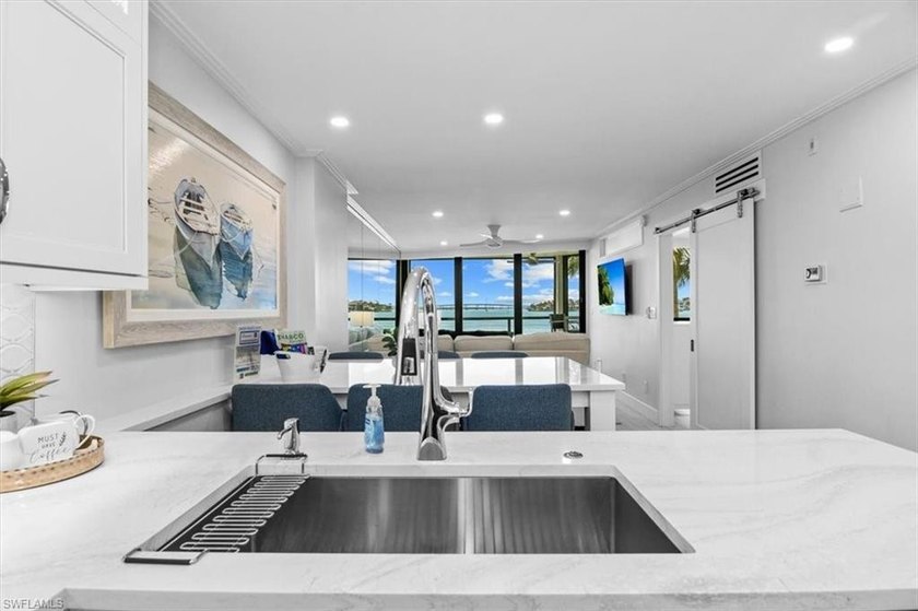 Situated in the coveted A-building, A209 offers sweeping - photo 12