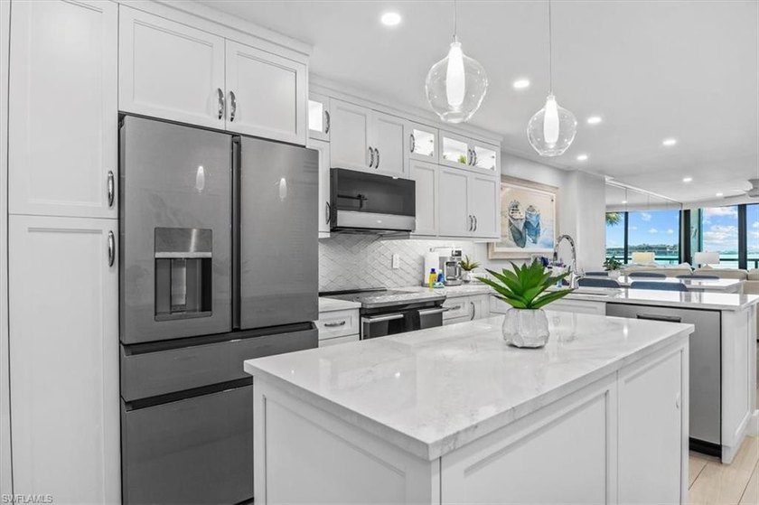 Situated in the coveted A-building, A209 offers sweeping - photo 15