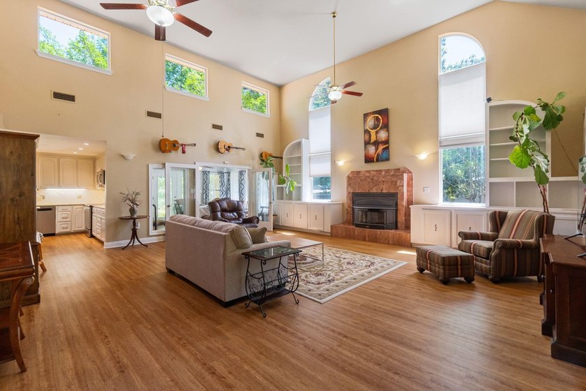 Enjoy morning coffee in your sunroom overlooking the private - photo 4