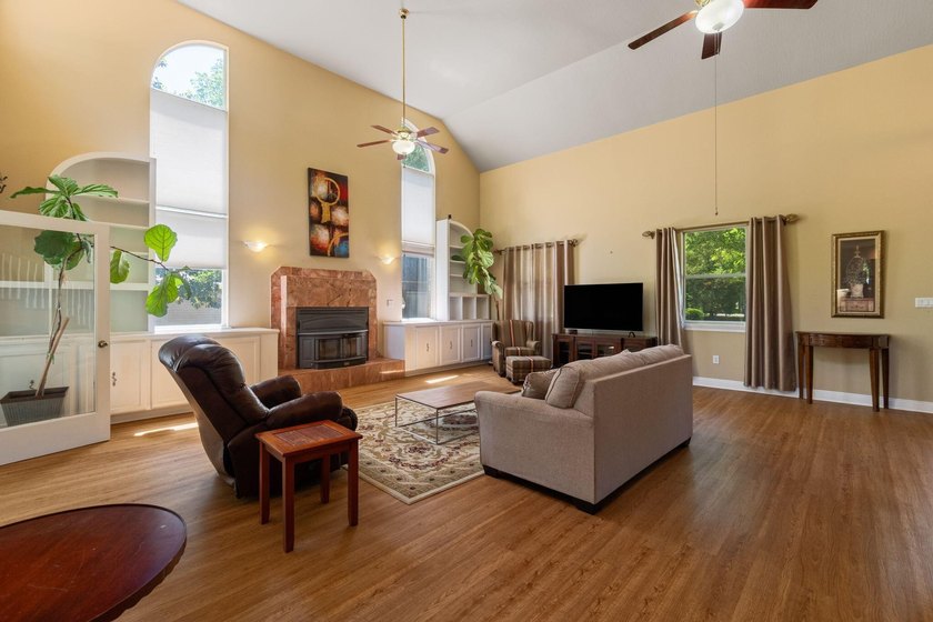 Enjoy morning coffee in your sunroom overlooking the private - photo 5