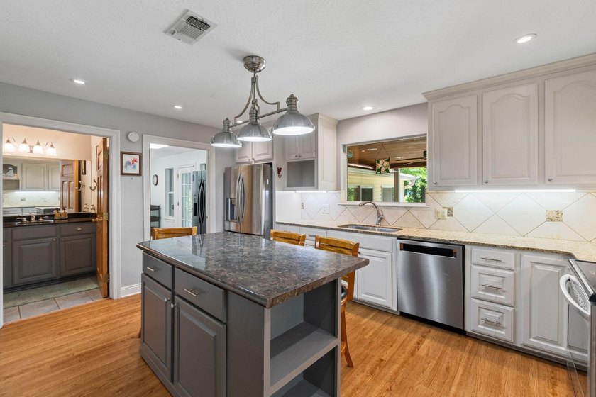 Enjoy morning coffee in your sunroom overlooking the private - photo 6