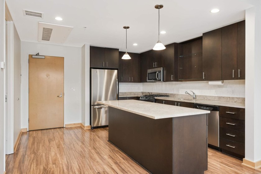 This stylish 1 bed condo at Cobalt offers an unmatched level of - photo 8