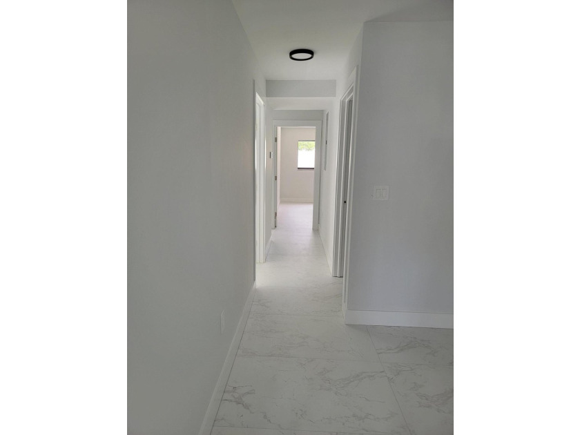 I am pleased to present this fully renovated, with new - photo 7