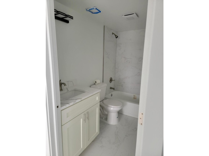 I am pleased to present this fully renovated, with new - photo 8