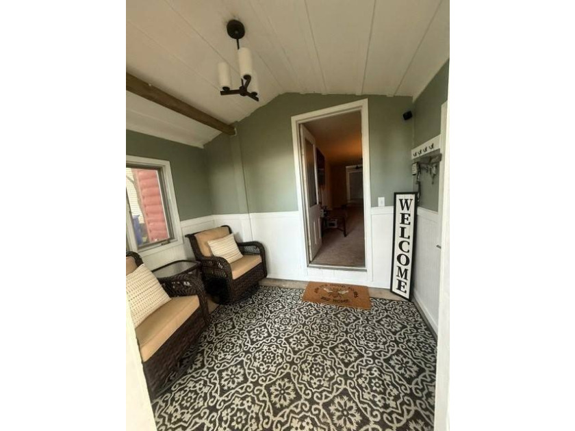 This 3-BR 1 bath Cutie is perfect for the family wanting a small - photo 3