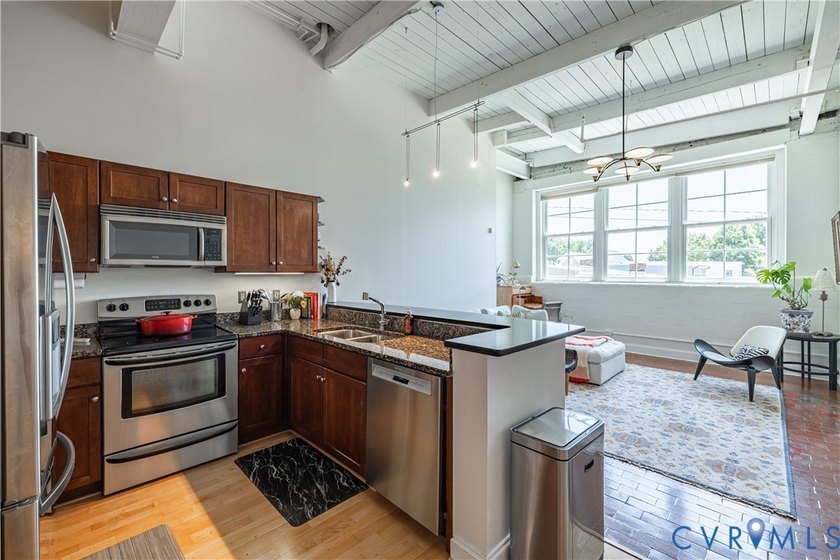 This bright and beautifully updated 2nd floor condo is nestled - photo 14