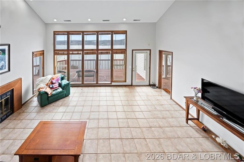 WOW! From the minute you walk in the door, the lake view is - photo 16