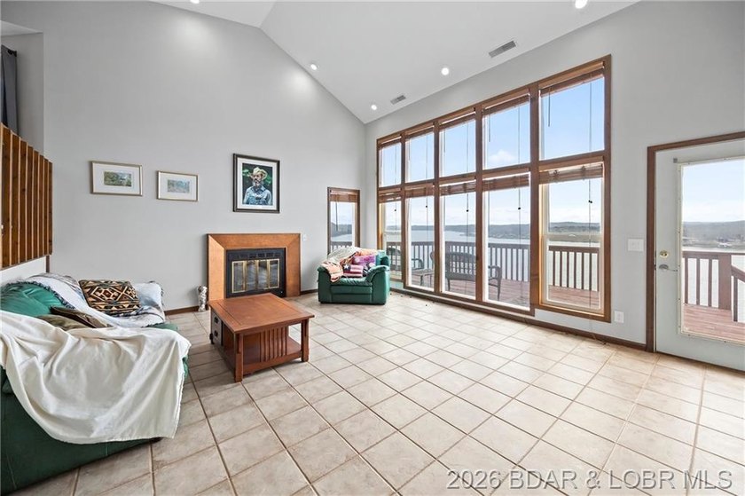 WOW! From the minute you walk in the door, the lake view is - photo 17