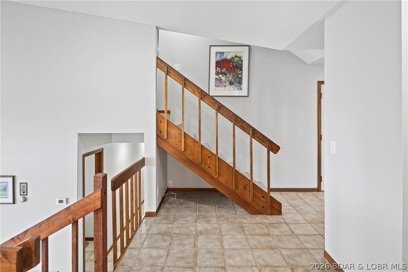 WOW! From the minute you walk in the door, the lake view is - photo 20