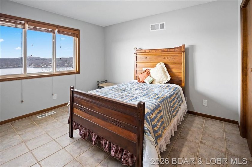 WOW! From the minute you walk in the door, the lake view is - photo 22