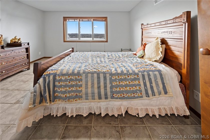 WOW! From the minute you walk in the door, the lake view is - photo 23
