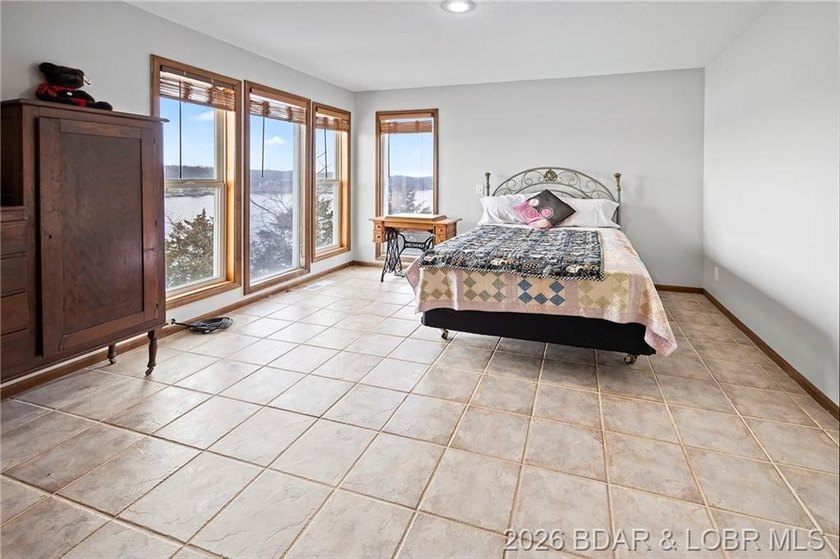WOW! From the minute you walk in the door, the lake view is - photo 25